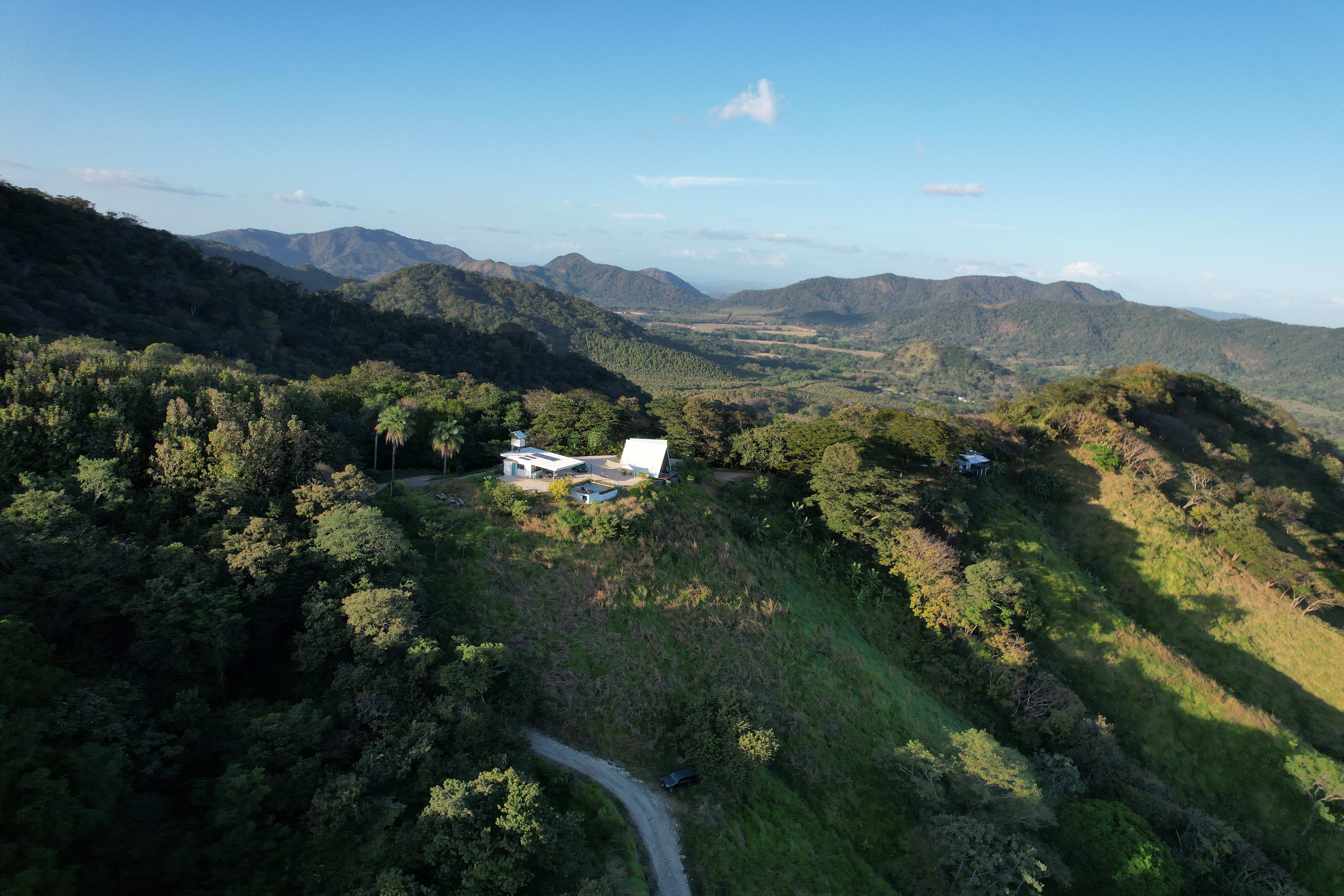 Aerial view of the exclusive Bluesky Lodge complex with access road in Guanacaste