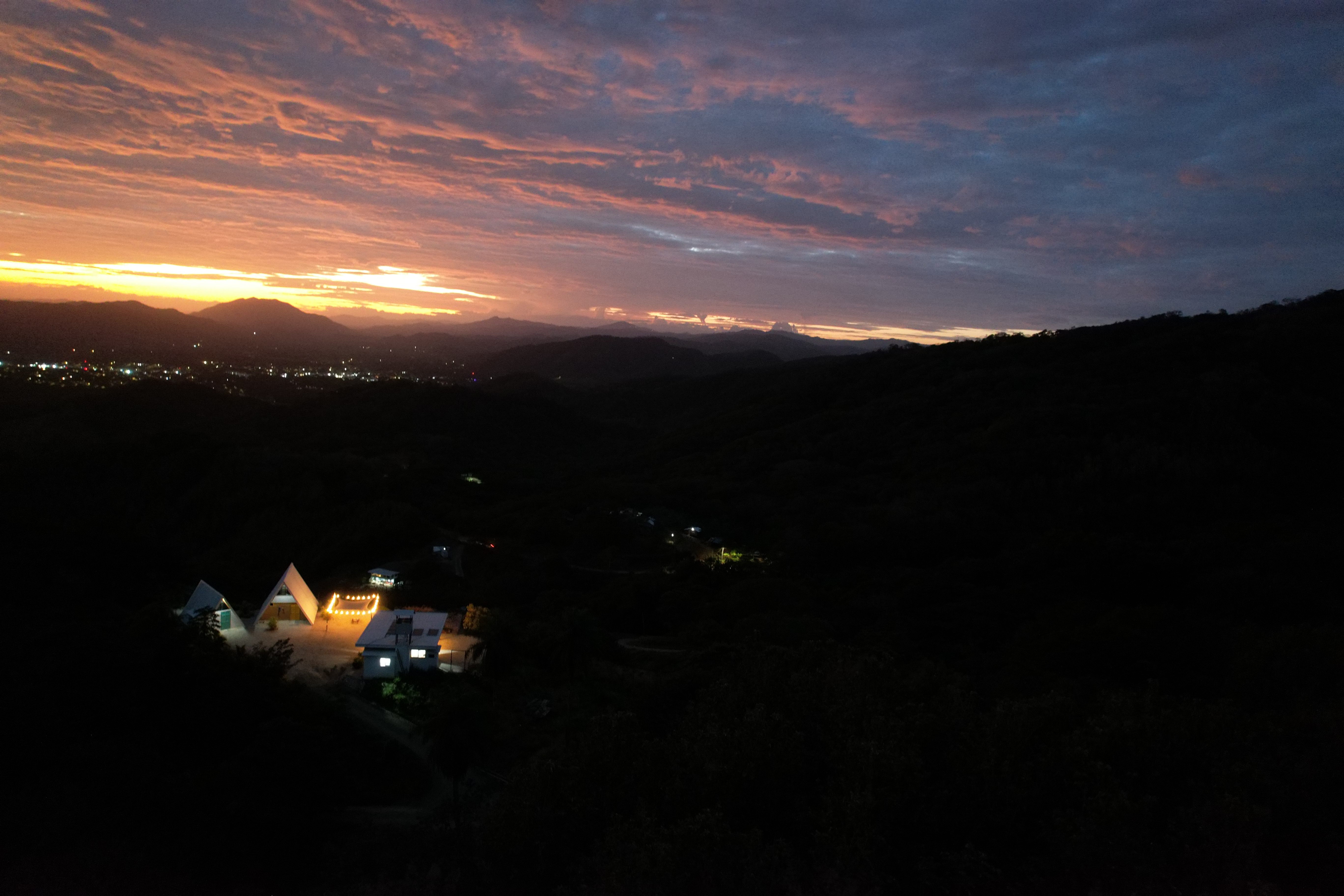 Morning aerial view with beautiful sunrise colors over Bluesky Lodge, an exclusive vacation stay